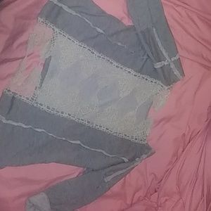 A comfy grey sweater with a white lace back